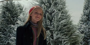 Movie still from “Jurassic World” (2015), directed by Colin Trevorrow – A girl in a red hat and a black jacket; Medium shot, Low angle