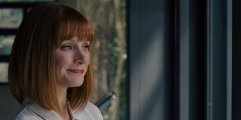 Movie still from “Jurassic World” (2015), directed by Colin Trevorrow – A person wearing a white shirt; Close Up shot, Over the shoulder angle
