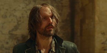 Movie still from “Jurassic World Dominion” (2022), directed by Colin Trevorrow – A person with long hair; Close Up shot, Low angle