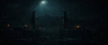 Movie still from “Jurassic World: Fallen Kingdom” (2018), directed by J.A. Bayona – A view of a night sky with a full moon in the background; Extreme Wide shot, High angle