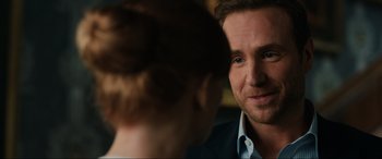 Movie still from “Jurassic World: Fallen Kingdom” (2018), directed by J.A. Bayona – A person talking to another person; Close Up shot, Over the shoulder angle