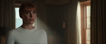 Movie still from “Jurassic World: Fallen Kingdom” (2018), directed by J.A. Bayona – A person wearing a white shirt; Close Up shot, Low angle