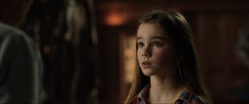 Movie still from “Jurassic World: Fallen Kingdom” (2018), directed by J.A. Bayona – A young girl is looking into the distance; Close Up shot, Over the shoulder angle