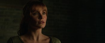 Movie still from “Jurassic World: Fallen Kingdom” (2018), directed by J.A. Bayona – A person with short red hair; Close Up shot, Low angle