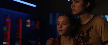 Movie still from “Jurassic World: Fallen Kingdom” (2018), directed by J.A. Bayona – A woman and a young girl in a dark room; Close Up shot, Over the shoulder angle
