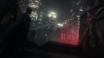 Movie still from “Justice League” (2017), directed by Zack Snyder – A man standing on the side of a building in the dark; Wide shot, Low angle