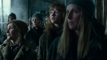 Movie still from “Justice League” (2017), directed by Zack Snyder – A group of women standing next to each other in a room; Medium shot, Low angle