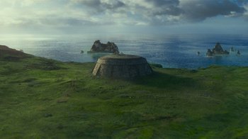 Movie still from “Justice League” (2017), directed by Zack Snyder – An image of an island in the middle of the ocean; Extreme Wide shot, High angle