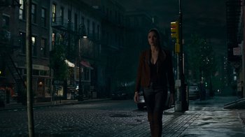 Movie still from “Justice League” (2017), directed by Zack Snyder – A woman walking down a street at night; Wide shot, Low angle