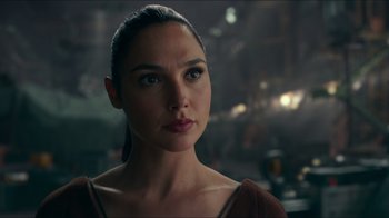 Movie still from “Justice League” (2017), directed by Zack Snyder – Gal gadot as wonder woman in a scene from batman v; Close Up shot, Over the shoulder angle