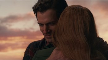 Movie still from “Justice League” (2017), directed by Zack Snyder – A person hugging another person; Close Up shot, Over the shoulder angle