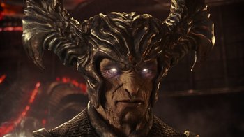 Movie still from “Justice League” (2017), directed by Zack Snyder – A person wearing a horned helmet; Close Up shot, Low angle