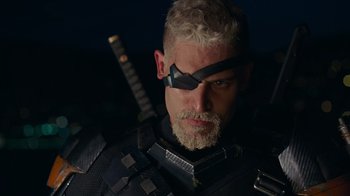 Movie still from “Justice League” (2017), directed by Zack Snyder – A person wearing a costume; Close Up shot, Over the shoulder angle