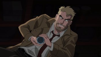 Movie still from “Justice League Dark: Apokolips War” (2020), directed by Christina Sotta – A man in a suit and tie holding a button; Close Up shot, Over the shoulder angle