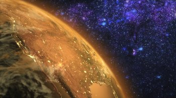 Movie still from “Justice League Dark: Apokolips War” (2020), directed by Christina Sotta – An image of an earth from outer space; Extreme Wide shot, Low angle