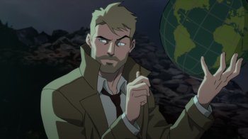 Movie still from “Justice League Dark: Apokolips War” (2020), directed by Christina Sotta – A man in a suit and tie holding an earth globe; Medium shot, High angle