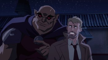 Movie still from “Justice League Dark: Apokolips War” (2020), directed by Christina Sotta – A man standing next to another man in a suit and tie; Medium shot, Over the shoulder angle