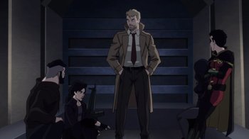 Movie still from “Justice League Dark: Apokolips War” (2020), directed by Christina Sotta – A man standing in front of a group of people; Wide shot, Over the shoulder angle