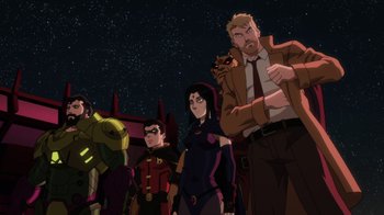 Movie still from “Justice League Dark: Apokolips War” (2020), directed by Christina Sotta – A group of people standing next to each other in front of a building; Wide shot, Low angle