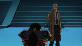 Movie still from “Justice League Dark: Apokolips War” (2020), directed by Christina Sotta – A man in a trench coat and tie holding a dog leash; Wide shot, Over the shoulder angle