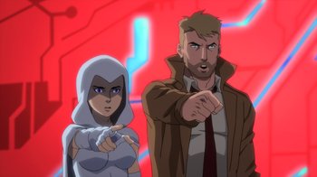 Movie still from “Justice League Dark: Apokolips War” (2020), directed by Christina Sotta – A man and a woman standing next to each other in front of a red background; Medium shot, Over the shoulder angle
