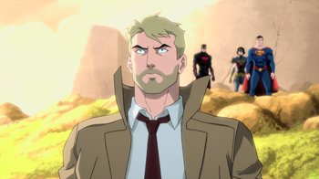 Movie still from “Justice League Dark: Apokolips War” (2020), directed by Christina Sotta – A man in a brown jacket and a red tie; Medium shot, Over the shoulder angle