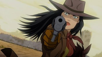 Movie still from “Justice League: Warworld” (2023), directed by Jeff Wamester – A woman in a cowboy hat holding a gun in her hand; Close Up shot, Over the shoulder angle