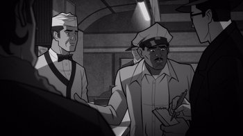 Movie still from “Justice League: Warworld” (2023), directed by Jeff Wamester – A black and white image of two men; Medium shot, Over the shoulder angle