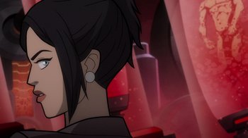 Movie still from “Justice League: Warworld” (2023), directed by Jeff Wamester – A person's ear with a red background; Close Up shot, Over the shoulder angle