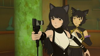 Movie still from “Justice League x RWBY: Super Heroes and Huntsmen Part One” (2023), directed by Kerry Shawcross – A woman holding a video camera in front of another woman; Close Up shot, Over the shoulder angle
