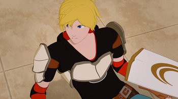 Movie still from “Justice League x RWBY: Super Heroes and Huntsmen Part One” (2023), directed by Kerry Shawcross – An animated woman with blonde hair wearing a black shirt; Medium shot, Overhead angle