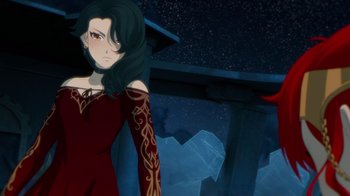 Movie still from “Justice League x RWBY: Super Heroes and Huntsmen Part One” (2023), directed by Kerry Shawcross – A woman in a red dress standing in front of a building; Medium shot, Over the shoulder angle