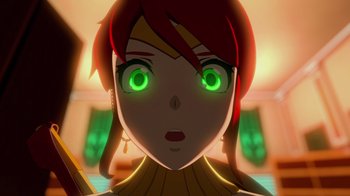 Movie still from “Justice League x RWBY: Super Heroes and Huntsmen Part One” (2023), directed by Kerry Shawcross – A woman's face with green eyes; Extreme Close Up shot, Low angle