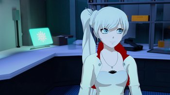 Movie still from “Justice League x RWBY: Super Heroes and Huntsmen Part One” (2023), directed by Kerry Shawcross – A woman standing in front of a laptop computer; Close Up shot, Over the shoulder angle