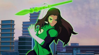 Movie still from “Justice League x RWBY: Super Heroes and Huntsmen Part Two” (2023), directed by Yssa Badiola – A woman with long black hair is holding a green object; Medium shot, Low angle