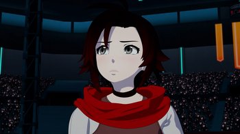 Movie still from “Justice League x RWBY: Super Heroes and Huntsmen Part Two” (2023), directed by Yssa Badiola – An animated girl wearing a red scarf looking at the camera; Close Up shot, High angle