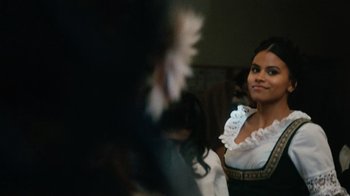 Movie still from “Atlanta” (2016), created by Donald Glover – A woman in a white dress is looking at the camera; Close Up shot, Over the shoulder angle