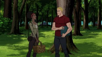 Movie still from “Justice Society: World War II” (2021), directed by Jeff Wamester – A man and a woman standing next to each other in the woods; Medium shot, Low angle