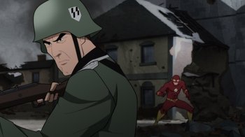 Movie still from “Justice Society: World War II” (2021), directed by Jeff Wamester – A man in a green jacket and a man in a red shirt; Medium shot, Over the shoulder angle