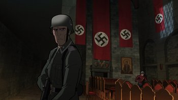 Movie still from “Justice Society: World War II” (2021), directed by Jeff Wamester – An animated picture of a man in a nazi garb in front of a church; Wide shot, Over the shoulder angle
