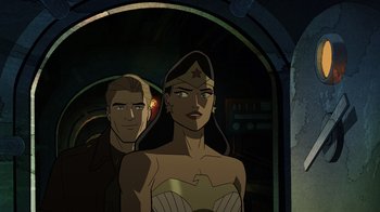 Movie still from “Justice Society: World War II” (2021), directed by Jeff Wamester – A man and a woman standing next to each other; Medium shot, Over the shoulder angle