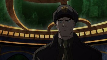 Movie still from “Justice Society: World War II” (2021), directed by Jeff Wamester – A man in a military uniform is looking at the camera; Close Up shot, High angle