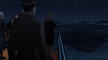 Movie still from “Justice Society: World War II” (2021), directed by Jeff Wamester – A man and a woman standing on a boat at night; Wide shot, High angle