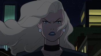 Movie still from “Justice Society: World War II” (2021), directed by Jeff Wamester – A woman with long white hair is crying; Close Up shot, Over the shoulder angle