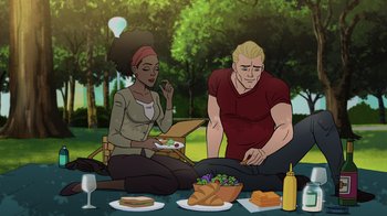 Movie still from “Justice Society: World War II” (2021), directed by Jeff Wamester – A man and a woman sitting at a table with food; Medium shot, High angle