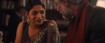 Movie still from “Khufiya” (2023), directed by Vishal Bhardwaj – An older man and a younger woman are talking to each other; Close Up shot, Over the shoulder angle
