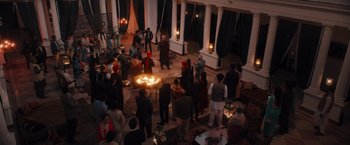 Movie still from “Khufiya” (2023), directed by Vishal Bhardwaj – A group of people standing around a fire pit; Extreme Wide shot, High angle