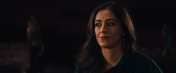 Movie still from “Khufiya” (2023), directed by Vishal Bhardwaj – A person with long dark hair; Close Up shot, Over the shoulder angle