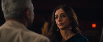 Movie still from “Khufiya” (2023), directed by Vishal Bhardwaj – A woman in a black shirt is talking to a man; Close Up shot, Over the shoulder angle