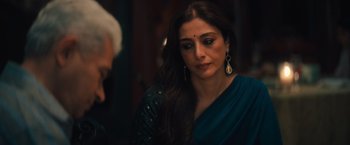 Movie still from “Khufiya” (2023), directed by Vishal Bhardwaj – A person wearing a blue sari; Close Up shot, Over the shoulder angle